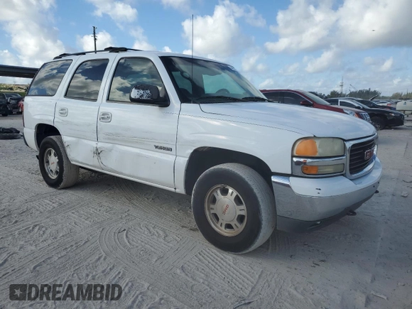 2002 GMC Yukon SLT with VIN 1GKEC13V12R196673, listed as a Copart auction lot 44921005 with 217,403 mi miles and Salvage Title. Bid and sale history available at carsss.com. Image 4.
