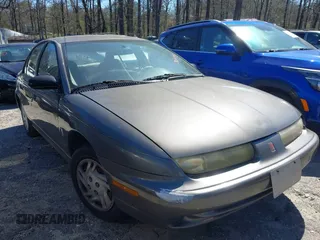 1998 Saturn SL z VIN 1G8ZH5282WZ264173, wystawiony jako IAAI lot #41821190 z przebiegiem 195 792 mil mil oraz . Historia ofert i sprzedaży dostępna na DreamBid. Obrazek 1.