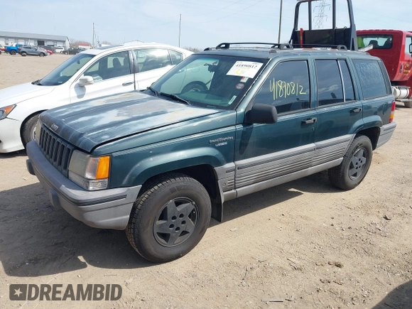 1994 Jeep Grand Cherokee Laredo with VIN 1J4GZ58S0RC266616, listed as a IAAI auction lot 41890812 with 190,000 mi miles. Bid and sale history available at carsss.com. Image 2.