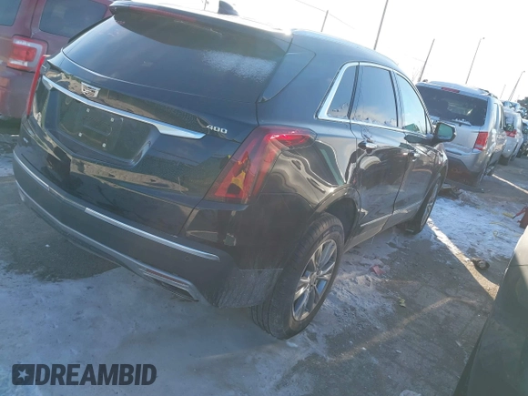 2021 Cadillac XT5 AWD Premium Luxury with VIN 1GYKNDRS2MZ152878, listed as a IAAI auction lot 41347259 with 21,891 mi miles. Bid and sale history available at carsss.com. Image 4.