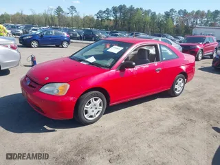 2001 Honda Civic LX with VIN 1HGEM215X1L103234, listed as a IAAI auction lot 42000826 with 264,599 mi miles. Bid and sale history available at carsss.com. Image 2.