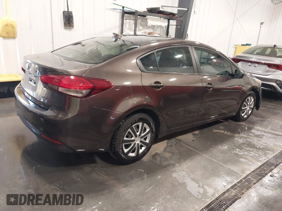 2017 Kia Forte LX with VIN 3KPFK4A71HE056667, listed as a IAAI auction lot 42030307 with 99,320 mi miles. Bid and sale history available at carsss.com. Image 4.