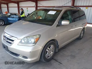 2005 Honda Odyssey EX-L with VIN 5FNRL38705B106488, listed as a IAAI auction lot 42545141 with 199,619 mi miles and . Bid and sale history available at DreamBid. Image 2.