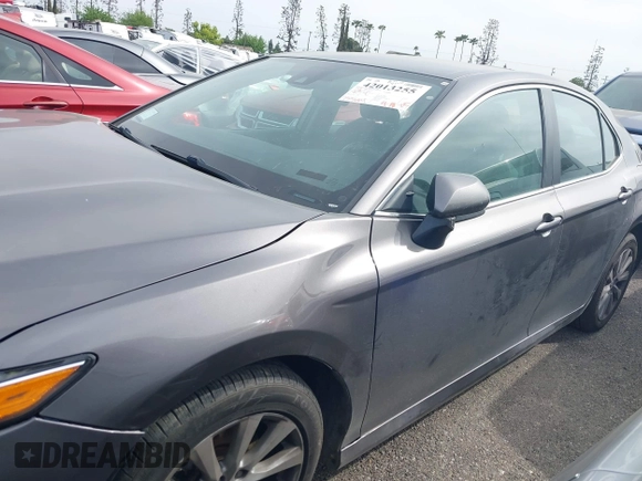 2019 Toyota Camry LE with VIN 4T1B11HK4KU254853, listed as a IAAI auction lot 42013255 with 153,664 mi miles and . Bid and sale history available at DreamBid. Image 14.