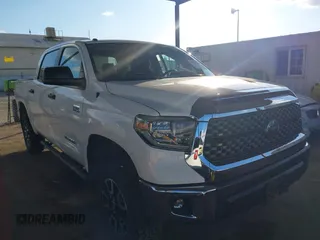 2018 Toyota Tundra SR5 z VIN 5TFDW5F16JX776543, wystawiony jako IAAI lot #40874026 z przebiegiem 59 636 mil mil oraz . Historia ofert i sprzedaży dostępna na DreamBid. Obrazek 1.