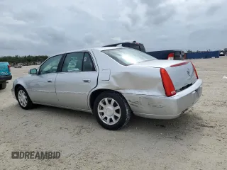 2010 Cadillac DTS 1SA z VIN 1G6KA5EY2AU135849, wystawiony jako Copart lot #79930734 z przebiegiem 98 396 mil mil oraz Nie do naprawy • Non repairable. Historia ofert i sprzedaży dostępna na DreamBid. Obrazek 2.