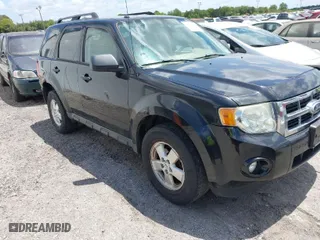 2011 Ford Escape XLT with VIN 1FMCU9D77BKA45274, listed as a IAAI auction lot 42073521 with 245,073 mi miles. Bid and sale history available at carsss.com. Image 1.
