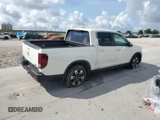 2017 Honda Ridgeline RTL with VIN 5FPYK2F53HB001434, listed as a Copart auction lot 58414335 with 187,711 mi miles and Salvage title. Bid and sale history available at DreamBid. Image 3.