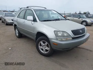 1999 Lexus RX 300 Luxury SUV with VIN JT6HF10U5X0017629, listed as a IAAI auction lot 41569806 with 174,068 mi miles. Bid and sale history available at carsss.com. Image 1.