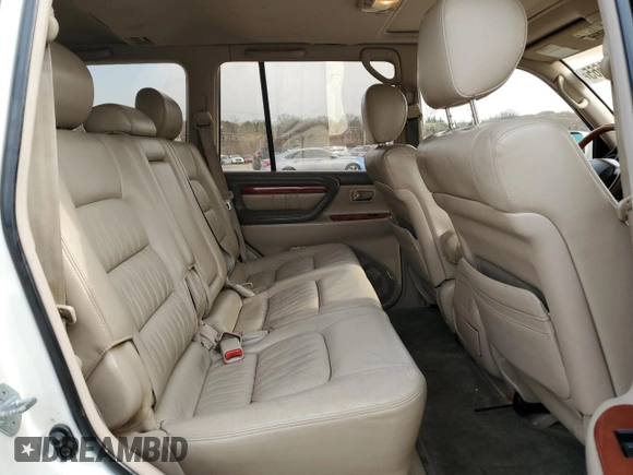 2000 Lexus LX 470 z VIN JT6HT00W8Y0126253, wystawiony jako Copart lot #49400665 z przebiegiem 181 328 mil mil oraz Szkody całkowita. Historia ofert i sprzedaży dostępna na DreamBid. Obrazek 11.