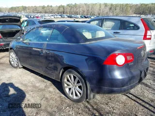 2008 Volkswagen Eos Turbo z VIN WVWBA71F68V050997, wystawiony jako IAAI lot #41858344 z przebiegiem 144 102 mil mil oraz . Historia ofert i sprzedaży dostępna na DreamBid. Obrazek 3.