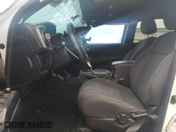 2017 Toyota Tacoma SR5 z VIN 3TMCZ5AN7HM065026, wystawiony jako Copart lot #60438365 z przebiegiem 122 329 mil mil oraz Szkoda całkowita • Salvage title. Historia ofert i sprzedaży dostępna na DreamBid. Obrazek 7.