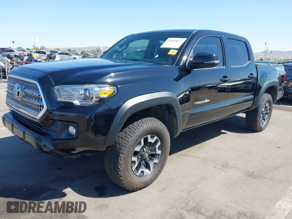 2016 Toyota Tacoma SR with VIN 3TMCZ5AN3GM019210, listed as a IAAI auction lot 42003617 with 171,581 mi miles. Bid and sale history available at carsss.com. Image 17.