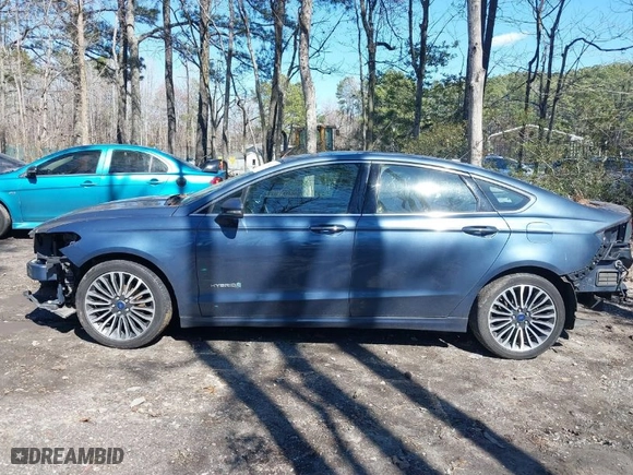 2018 Ford Fusion Hybrid Titanium with VIN 3FA6P0RUXJR151320, listed as a IAAI auction lot 41706229 with 275,101 mi miles. Bid and sale history available at carsss.com. Image 14.