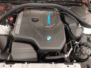 2023 BMW 3 Series 330e xDrive with VIN 3MW39FS05P8D20575, listed as a IAAI auction lot 42076033 with 10,875 mi miles. Bid and sale history available at carsss.com. Image 10.