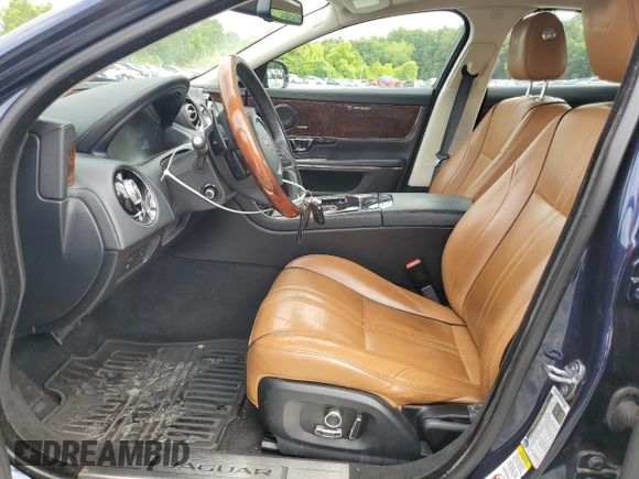 2017 Jaguar XJ R-Sport with VIN SAJWA1C70H8W05558, listed as a Copart auction lot 59759165 with 102,230 mi miles and Salvage title. Bid and sale history available at DreamBid. Image 7.