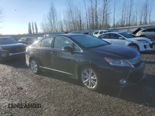 2010 Lexus HS 250h with VIN JTHBB1BA2A2006577, listed as a Copart auction lot 84060554 with 116,228 mi miles and Salvage Title. Bid and sale history available at DreamBid. Image 4.