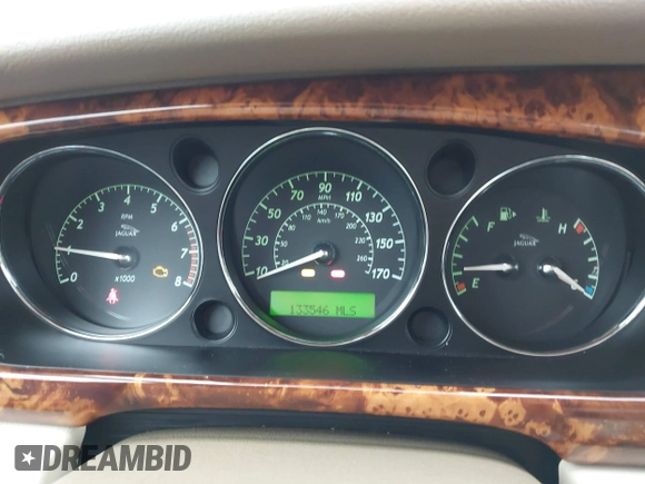 2004 Jaguar XJ with VIN SAJWA71C94SG29019, listed as a IAAI auction lot 41664978 with 133,546 mi miles. Bid and sale history available at carsss.com. Image 7.