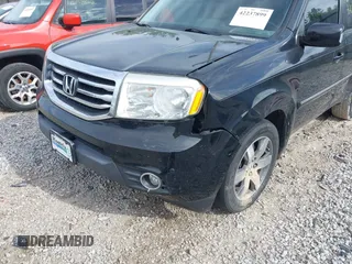 2013 Honda Pilot Touring with VIN 5FNYF3H93DB031630, listed as a IAAI auction lot 42237899 with 198,523 mi miles and . Bid and sale history available at DreamBid. Image 6.