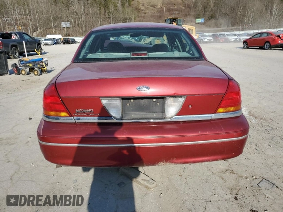 2001 Ford Crown Victoria LX z VIN 2FAFP74W41X205147, wystawiony jako Copart lot #46240035 z przebiegiem 65 495 mil mil oraz Szkoda całkowita • Salvage title. Historia ofert i sprzedaży dostępna na DreamBid. Obrazek 6.