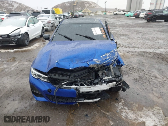 2022 BMW 3 Series 330i z VIN 3MW5R1J06N8C49056, wystawiony jako IAAI lot #41496252 z przebiegiem Nie podano mil oraz . Historia ofert i sprzedaży dostępna na DreamBid. Obrazek 11.