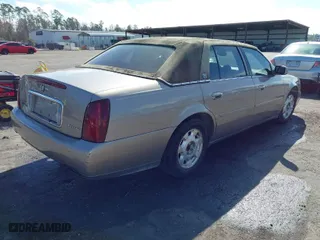 2000 Cadillac DeVille with VIN 1G6KD54Y6YU258542, listed as a IAAI auction lot 41398116 with 119,459 mi miles. Bid and sale history available at carsss.com. Image 4.