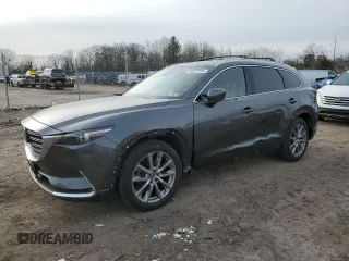 2018 Mazda CX-9 Signature with VIN JM3TCBEY1J0231982, listed as a Copart auction lot 45221555 with 107,059 mi miles and Salvage Title. Bid and sale history available at carsss.com. Image 1.