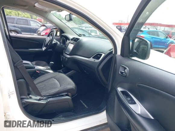 2014 Dodge Journey SXT z VIN 3C4PDCBBXET135001, wystawiony jako IAAI lot #42318360 z przebiegiem 152 321 mil mil oraz . Historia ofert i sprzedaży dostępna na DreamBid. Obrazek 5.