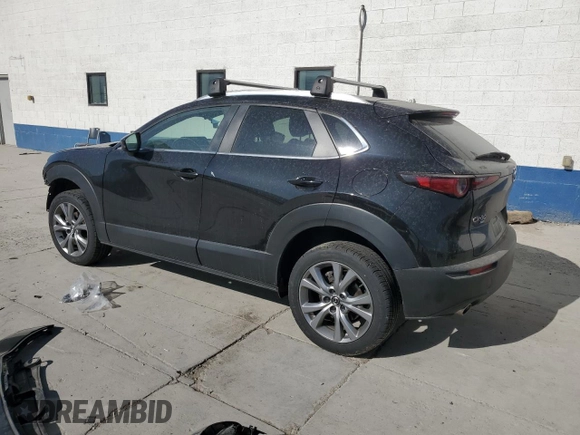 2023 Mazda CX-30 S Carbon Edition with VIN 3MVDMBCM6PM504431, listed as a Copart auction lot 61154795 with 90,396 mi miles and Salvage title. Bid and sale history available at DreamBid. Image 2.