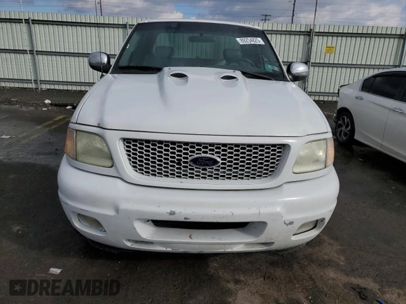 2002 Ford F-150 XL z VIN 2FTRX08L12CA26636, wystawiony jako Copart lot #89254825 z przebiegiem 133 637 mil mil oraz Szkoda całkowita • Salvage title. Historia ofert i sprzedaży dostępna na DreamBid. Obrazek 5.