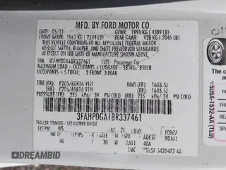 2011 Ford Fusion S with VIN 3FAHP0GA1BR337461, listed as a IAAI auction lot 41715964 with 219,486 mi miles. Bid and sale history available at carsss.com. Image 9.