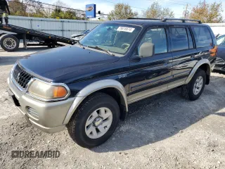 2002 Mitsubishi Montero XLS z VIN JA4MT31R02P013455, wystawiony jako Copart lot #79816674 z przebiegiem 106 731 mil mil oraz Czysty tytuł • Clean title. Historia ofert i sprzedaży dostępna na DreamBid. Obrazek 1.
