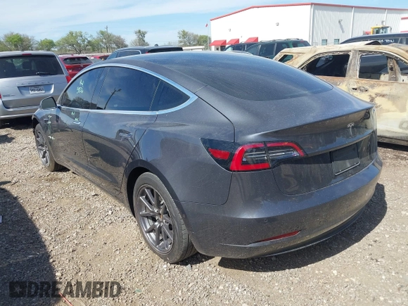 2019 Tesla Model 3 Mid Range with VIN 5YJ3E1EA5KF327679, listed as a IAAI auction lot 41804379 with 87,208 mi miles and . Bid and sale history available at DreamBid. Image 3.