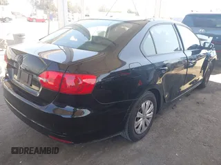 2014 Volkswagen Jetta Sedan S with VIN 3VW2K7AJ3EM371951, listed as a IAAI auction lot 41999491 with 107,530 mi miles. Bid and sale history available at carsss.com. Image 4.
