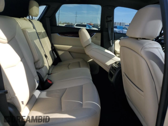 2018 Cadillac XT5 Premium Luxury FWD z VIN 1GYKNERS3JZ139719, wystawiony jako Copart lot #52436595 z przebiegiem Nie podano mil oraz Szkody całkowita. Historia ofert i sprzedaży dostępna na DreamBid. Obrazek 11.