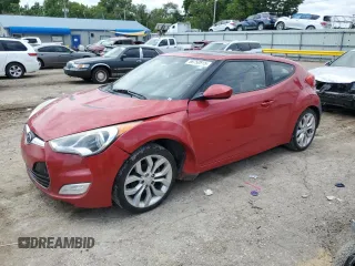 2012 Hyundai Veloster w/Red Int with VIN KMHTC6ADXCU060661, listed as a Copart auction lot 58750915 with 130,947 mi miles and Salvage title. Bid and sale history available at DreamBid. Image 1.