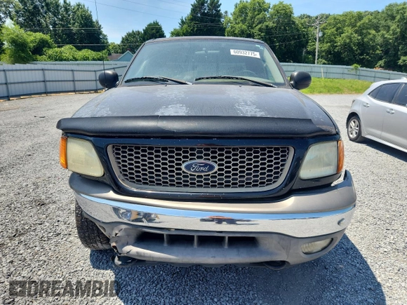 2004 Ford F-150 XL with VIN 2FTRX18W04CA13170, listed as a Copart auction lot 60932775 with 233,249 mi miles and Salvage title. Bid and sale history available at DreamBid. Image 5.