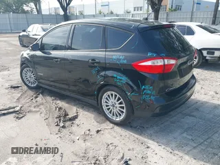 2013 Ford C-Max SE z VIN 1FADP5AU6DL517227, wystawiony jako IAAI lot #42436140 z przebiegiem 156 134 mil mil oraz . Historia ofert i sprzedaży dostępna na DreamBid. Obrazek 3.