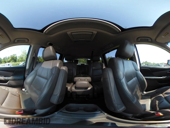 2011 Honda Odyssey Touring with VIN 5FNRL5H97BB073708, listed as a IAAI auction lot 42409164 with 141,986 mi miles and . Bid and sale history available at DreamBid. Image 18.