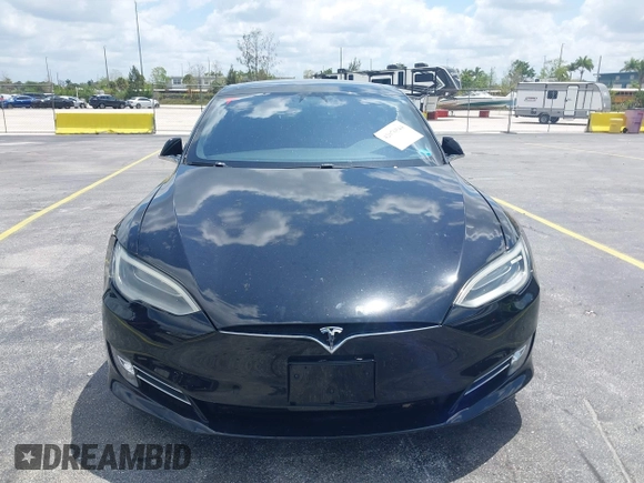 2017 Tesla Model S 100D with VIN 5YJSA1E47HF185734, listed as a IAAI auction lot 42076544 with 56,682 mi miles. Bid and sale history available at carsss.com. Image 6.
