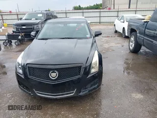2014 Cadillac ATS Luxury AWD z VIN 1G6AH5R30E0150854, wystawiony jako IAAI lot #42422421 z przebiegiem 96 713 mil mil oraz . Historia ofert i sprzedaży dostępna na DreamBid. Obrazek 12.