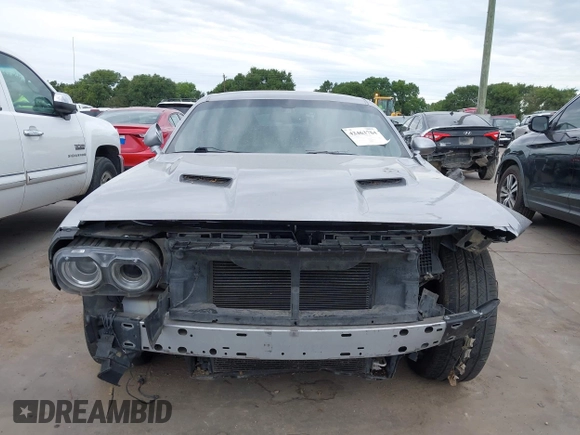 2016 Dodge Challenger SXT Plus z VIN 2C3CDZAG9GH184110, wystawiony jako IAAI lot #42463784 z przebiegiem 160 484 mil mil oraz . Historia ofert i sprzedaży dostępna na DreamBid. Obrazek 13.