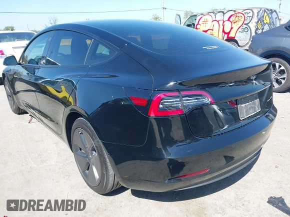 2021 Tesla Model 3 Long Range with VIN 5YJ3E1EB2MF065583, listed as a IAAI auction lot 42067399 with 52,333 mi miles. Bid and sale history available at carsss.com. Image 3.