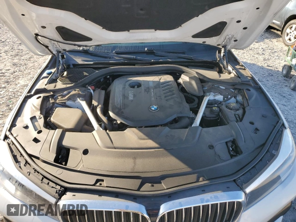 2019 BMW 7 Series 740i с VIN WBA7E2C51KB218262, выставлен на аукционе Copart как лот 52755095 с пробегом 55 082 миль миль и Списание • Salvage title. История ставок и продаж доступна на DreamBid. Изображение 11.