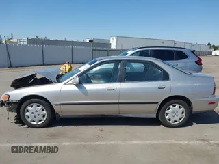 1997 Honda Accord LX with VIN 1HGCD5635VA207079, listed as a IAAI auction lot 42599112 with 267,085 mi miles and . Bid and sale history available at DreamBid. Image 15.