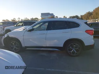 2019 BMW X1 sDrive28i z VIN WBXHU7C54K3H45462, wystawiony jako IAAI lot #41209117 z przebiegiem 52 719 mil mil oraz . Historia ofert i sprzedaży dostępna na DreamBid. Obrazek 14.