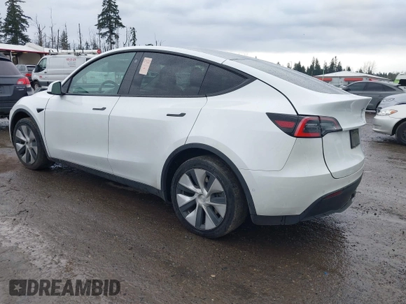 2021 Tesla Model Y Standard Range with VIN 5YJYGDED3MF103499, listed as a IAAI auction lot 41632064 with 132,846 mi miles and . Bid and sale history available at DreamBid. Image 3.