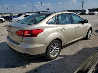 2018 Ford Focus SE z VIN 1FADP3FE8JL331853, wystawiony jako Copart lot #74013984 z przebiegiem 73 237 mil mil oraz Szkoda całkowita • Salvage title. Historia ofert i sprzedaży dostępna na DreamBid. Obrazek 3.