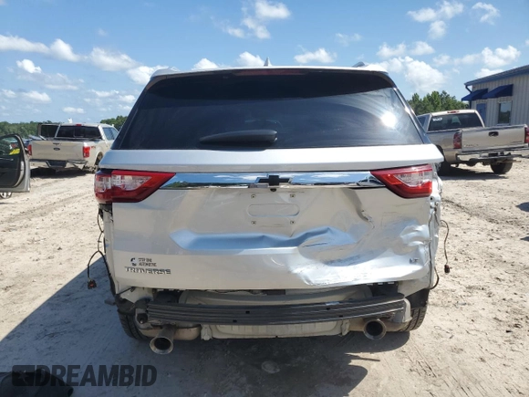 2018 Chevrolet Traverse LT Cloth with VIN 1GNERGKW7JJ282002, listed as a Copart auction lot 61564495 with 105,048 mi miles and Salvage title. Bid and sale history available at DreamBid. Image 6.