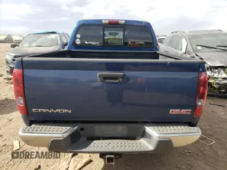 2006 GMC Canyon SLE2 with VIN 1GTDT136968311810, listed as a Copart auction lot 77146164 with 243,109 mi miles and Salvage Title. Bid and sale history available at carsss.com. Image 6.